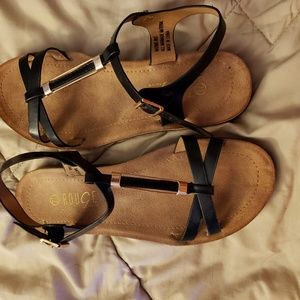 Black and gold sandals